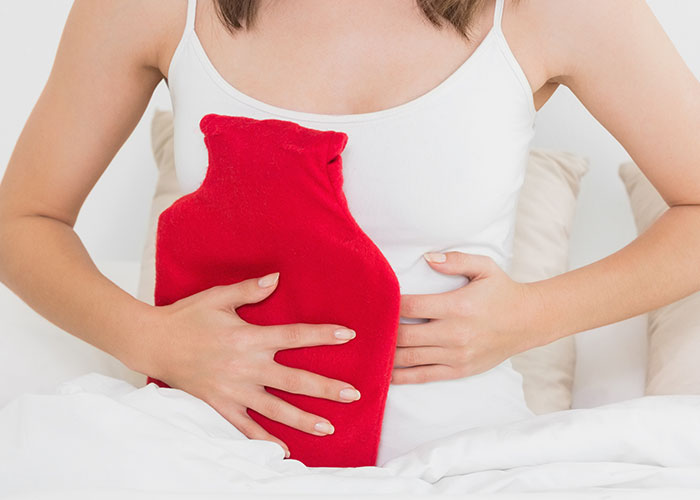 Como aliviar as cólicas menstruais